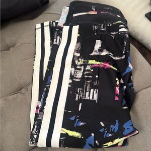 Black with geometric shapes. Calf length leggings by DKNY.